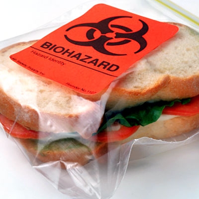 Bagged sandwich with Biohazard sticker across it